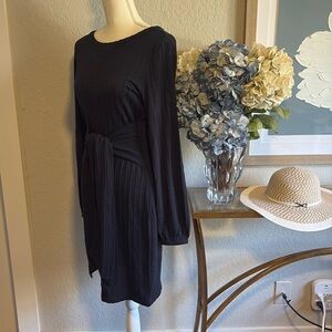 Women’s knit dress with a boat neck line size medium